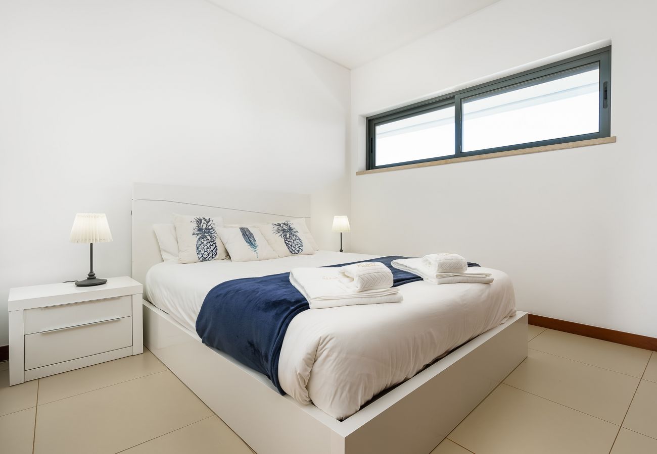 Bedroom with wardrobe and air conditioning